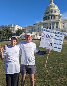 Fathom Agent Nick Nickerson and his son Adam posing in front of the U.S. Capitol building