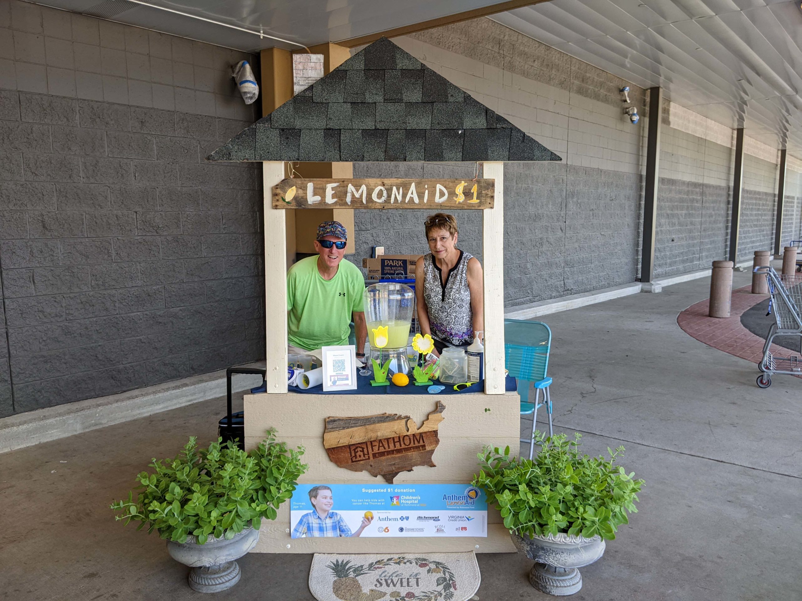 Realty Agents raising charity funds by selling lemonade