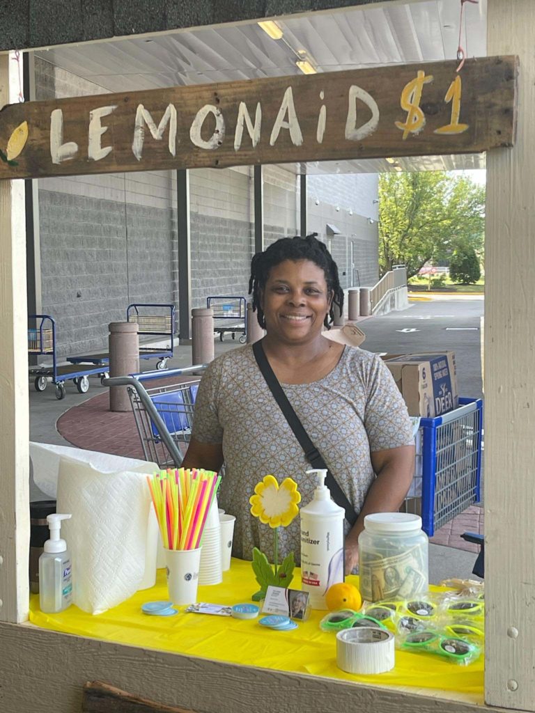 Realty Agents raising charity funds by selling lemonade