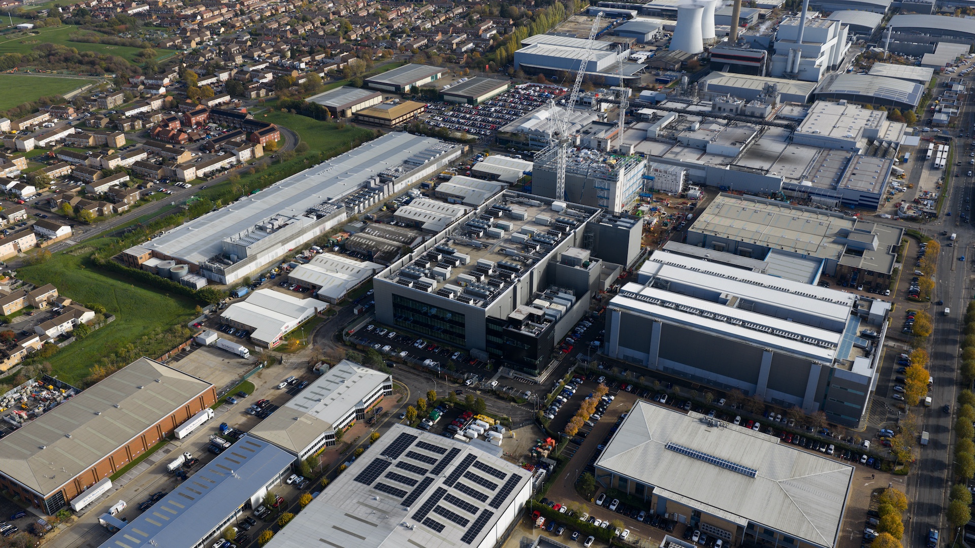 Large AI data center located near residential home in a community.